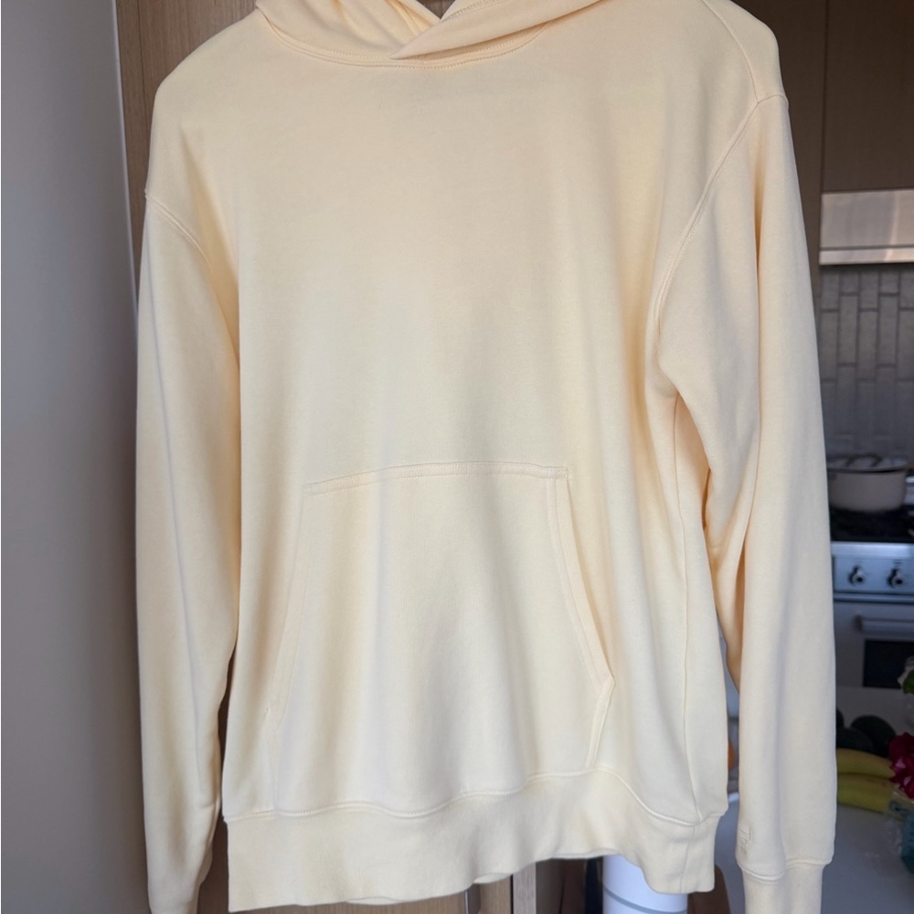 TNA AiryAF Fleece in butter yellow size S